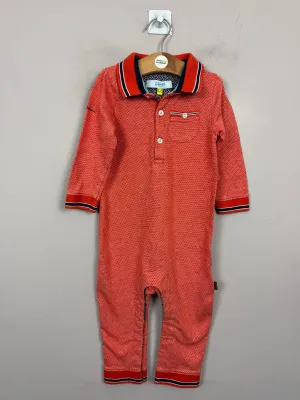 Baker orange polo romper 12-18m