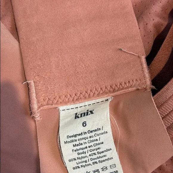 Knix Pink Wireless Bra with Adjustable Straps and Seamless Design